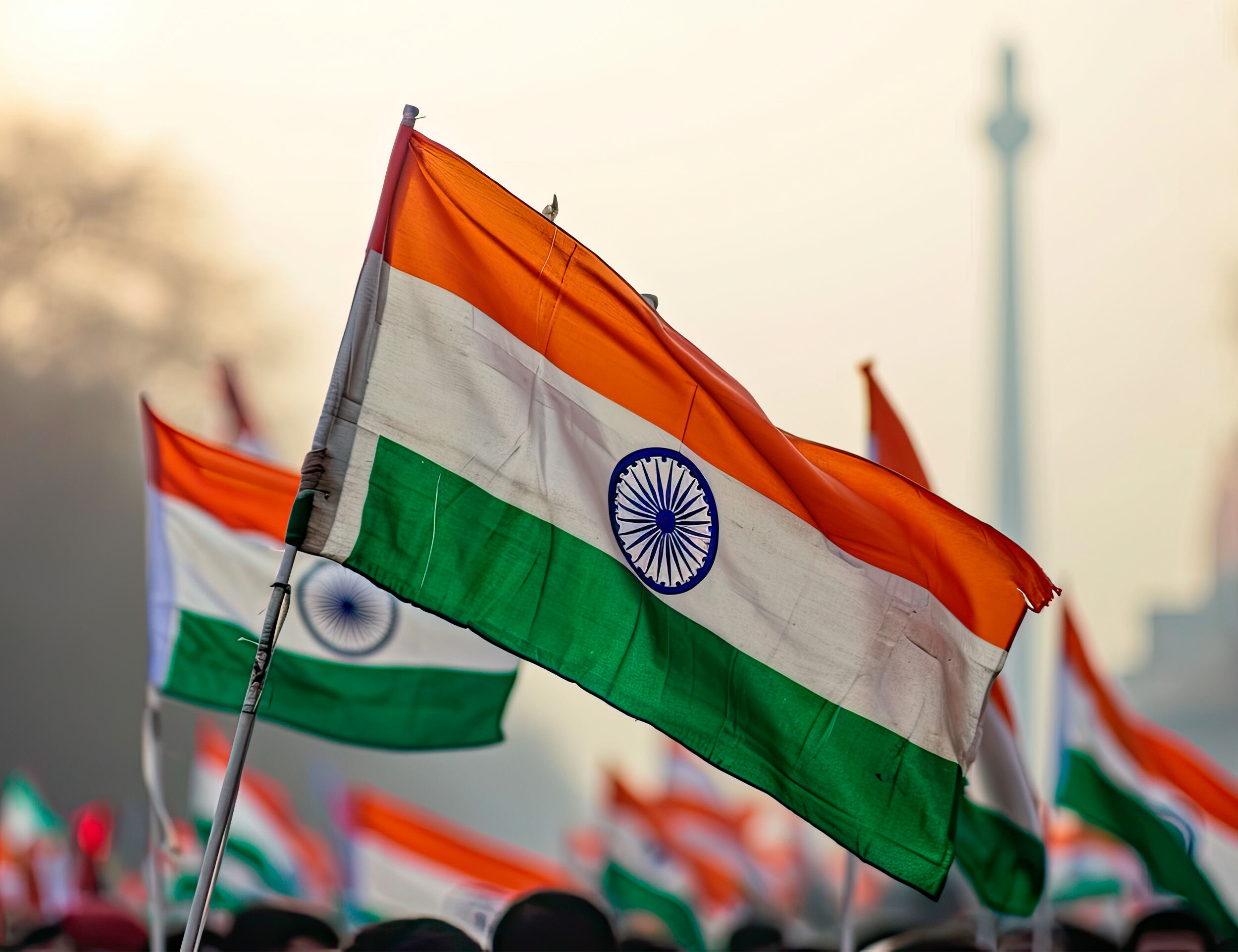 Peaople waving indian national falg in air 